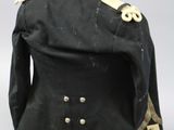 an image of a black jacket on a mannequin head