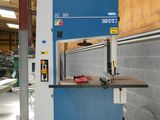 a machine that is sitting on a pallet in a building