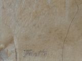 a drawing of a man on a piece of cardboard
