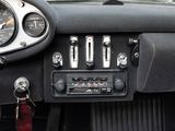 a car dashboard with a clock and a radio in it