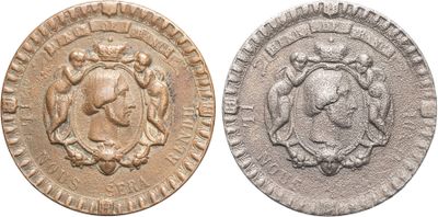 a close up of a coin with an image of a woman on it