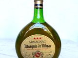 a bottle of liquor that is sitting on a table