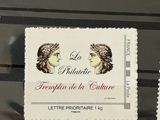 a picture of a stamp with a picture of two women on it