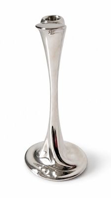 a silver candle holder on a white background