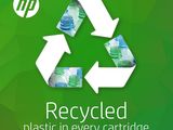 a green background with a recycled logo and a pile of water bottles