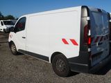 a white van that is parked in a lot