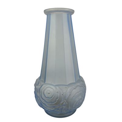 a white vase with a rose design on it
