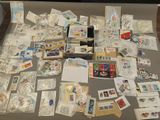 a table with a lot of cards and postcards on it