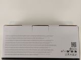 the back of a white box with a black and white logo on it
