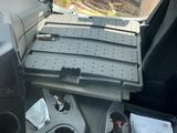 a view of a car ' s dashboard from the inside of the vehicle