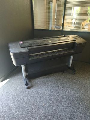 a black piano sitting in a corner in a room