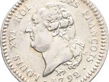 a close up of a coin with a woman ' s head on it