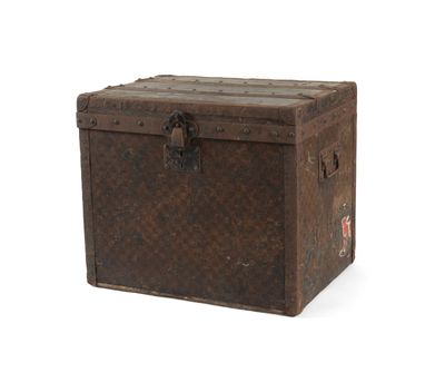 an old trunk that is sitting on a white surface