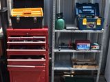 many tools on the shelves in the garage