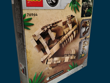 a box of legos with a picture of a dinosaur on it