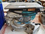 an image of a table saw in a workshop