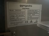 a sign on the side of a refrigerator that says gmmgastro