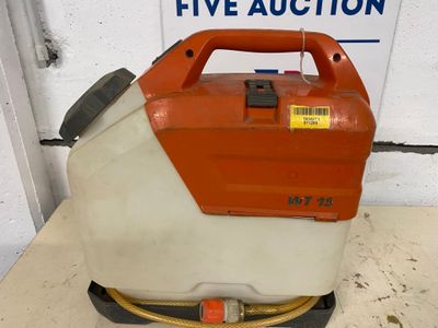 an orange and white sprayer sitting on top of a table