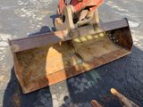 a bulldozer that is sitting on the ground