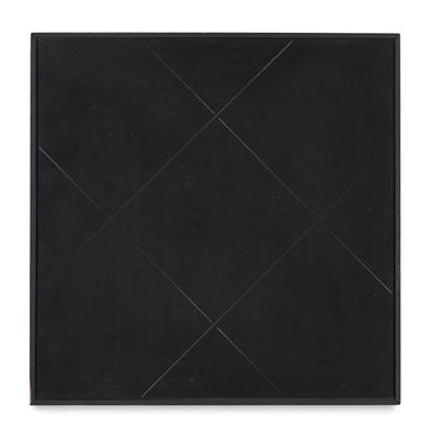 a black square tile on a white background