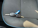 a car key in the back seat of a car