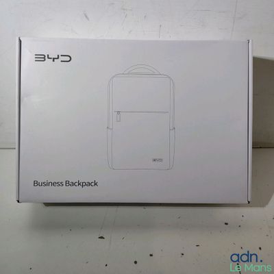 the box of a white backpack sitting on top of a table