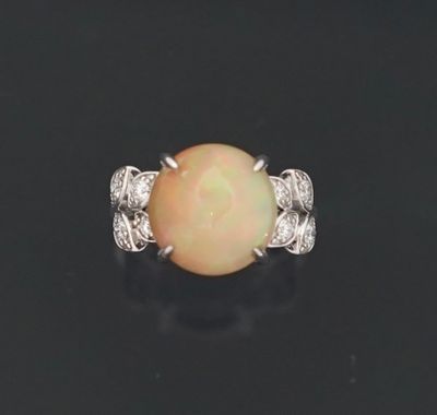 Bague en or gris 18k 750 millièmes ornée d'une opale de 4,7 …