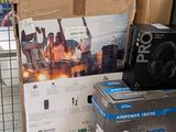 boxes of electronics are stacked on top of each other in a store