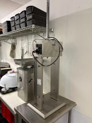 an image of a commercial kitchen with stainless steel counter tops