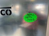 a picture of a stainless steel refrigerator with a sticker on it