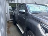 a picture of a truck parked in front of a building