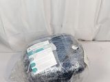a close up of a plastic bag with a pair of socks on top of it