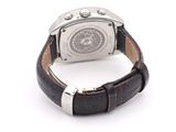 an image of a close up of a wrist watch on a white surface