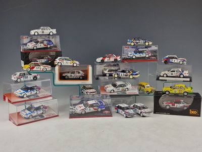 a lot of toy cars that are in a display case