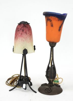 two lamps that are sitting next to each other on a table