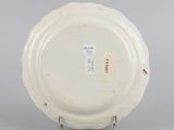 underside view of a plate showing the base of the plate and the bottom of the plate