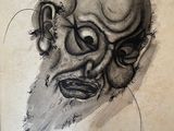 drawing of an old man with a beard and mustache on a piece of paper