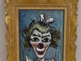 an image of a painting of a clown in a gold frame