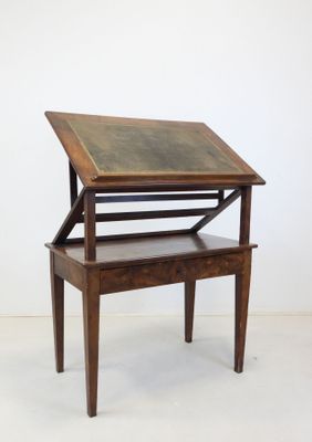 an image of a wooden desk with a glass top