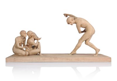 sculpture of a man and a woman playing with a baby on a wooden base