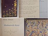 several pages of a book with a picture of flowers on them
