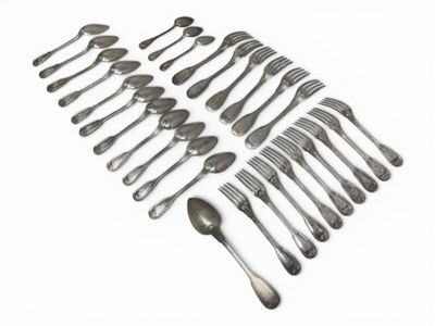 a lot of spoons and forks laid out on a white surface