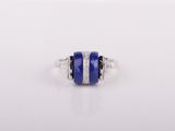 the person blue sapphire and diamond ring