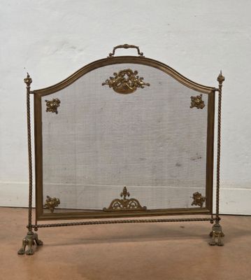 fireplace screen in the shape of a fireplace screen with a decorative design
