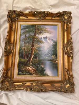 an image of a painting of a mountain scene in a gold frame