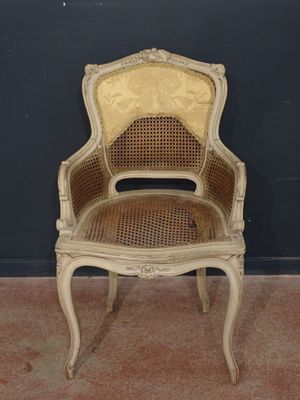 a chair that is sitting in front of a wall