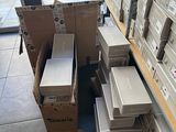 many boxes and boxes on the floor in a store