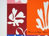 a picture of a picture of flowers and leaves on a wall