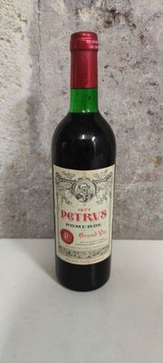 a bottle of wine that is sitting on a table