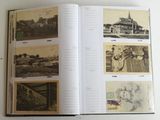 an open book with pictures of buildings and people on it